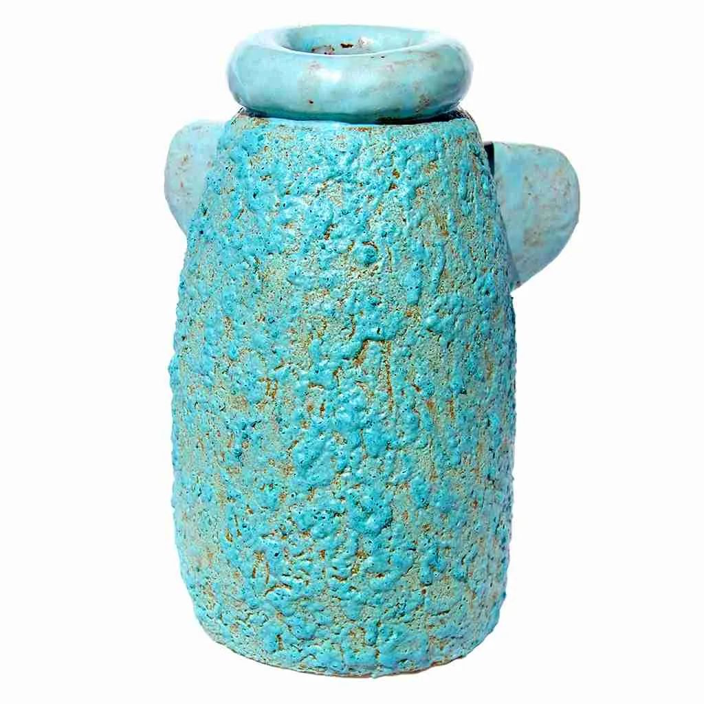 An interesting turquoise glaze on a pot that vaguely resembles an angel.