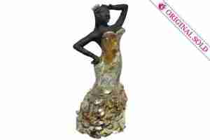 Flamenco dancer, gold raku lustre