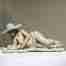stoneware sculpture of a sunbather