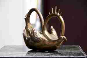 golden bird stoneware sculpture