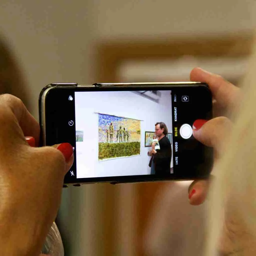 oil painting through a camera screen at an exhibition