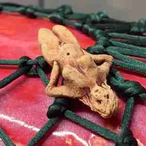 tiny goddess crew on ceramic chilli zeppelin sculpture by Emma Plunkett
