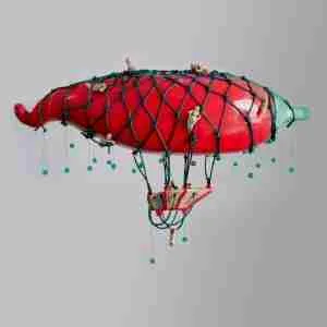 stoneware sculpture of a red chilli zeppelin, with a crew of tiny ancient goddesses
