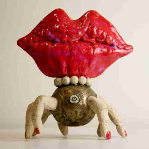 3D surreal composition - robot sculpture with large red glossy lips