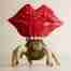 3D surreal composition - robot sculpture with large red glossy lips