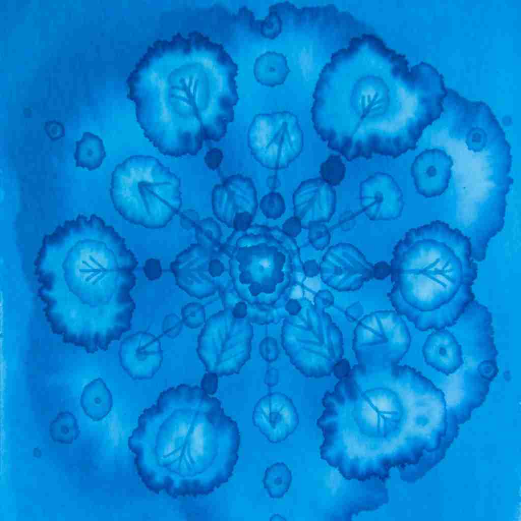 deep and dreamy watercolour snowflake painting in blue