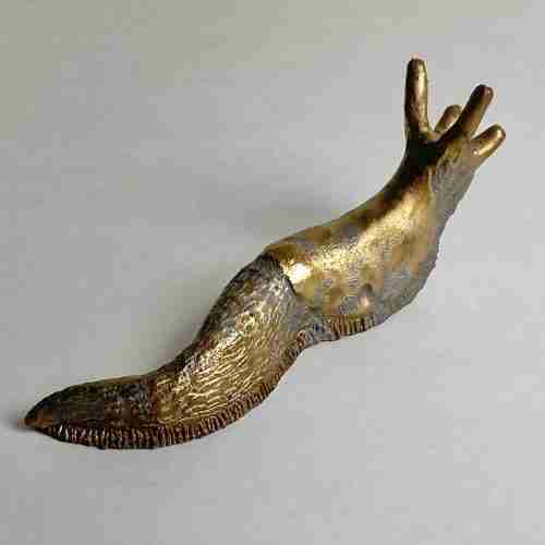 stoneware golden ceramic slug sculpture