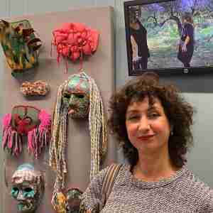 Marianna Magurudumian-O'Reilly Artist with her masks