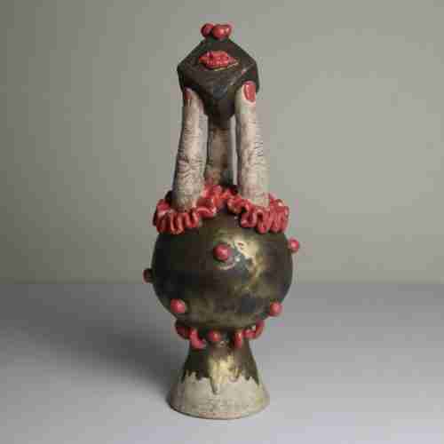 quirky stoneware surreal sculpture with a circus vibe