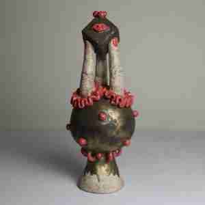 Stoneware surreal sculpture with geometric shapes, fingers and tiny lips