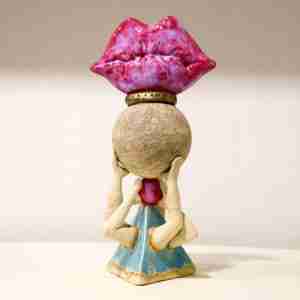 Stoneware surreal sculpture with big glossy lips