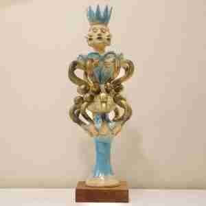 Stoneware surreal sculpture with many arms