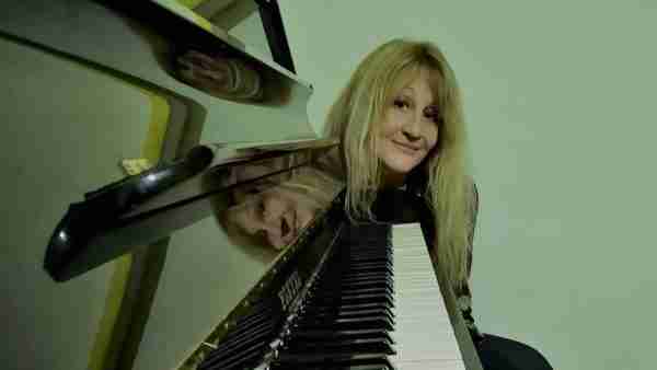Mix Amylo - musician, composer, artist, singer-songwriter and writer