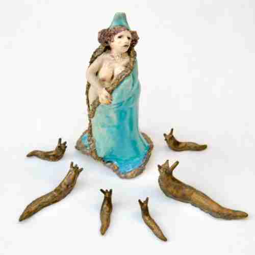 breast feeding mother sculpture in the style of 1920's