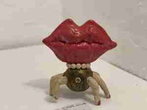 Stoneware sculpture with lips and fingers by Emma Plunkett