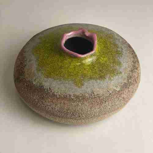stoneware orifice bowl with hand made glazes - pink lips and chartreuse green spray
