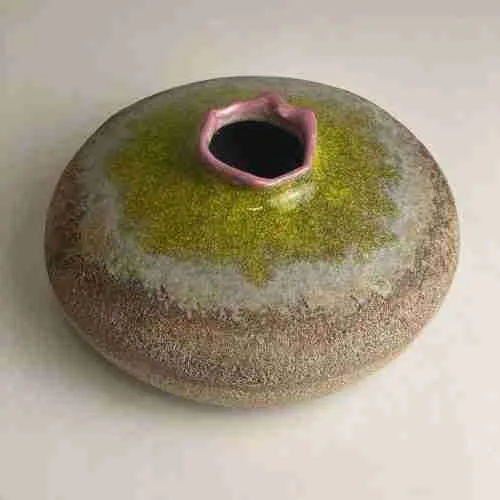 stoneware orifice bowl with hand made glazes - pink lips and chartreuse green spray