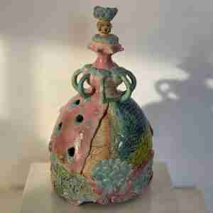 Highly glazed ceramic art object of a Benthic Goddess.