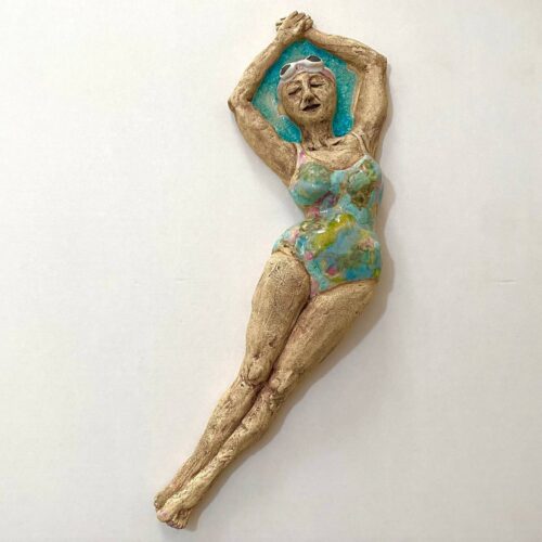 restful swimmer, wall hanging ceramic sculpture