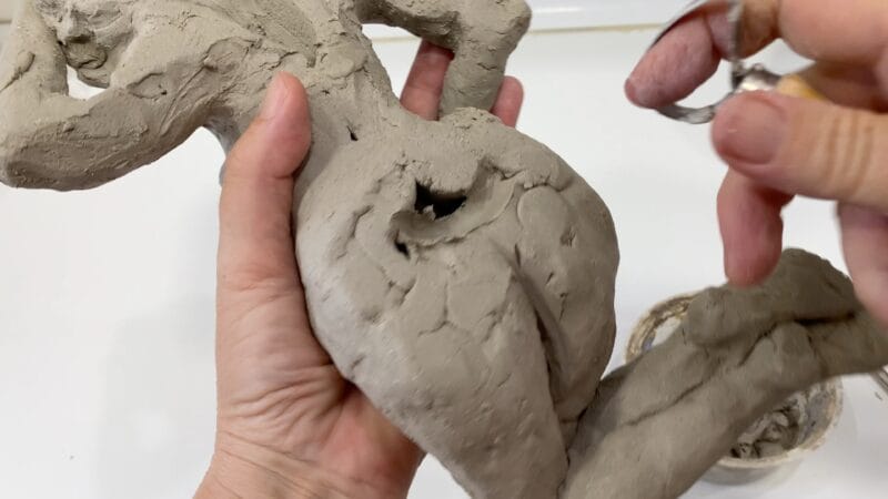 Hollowing out a figure in the clay. What it feels like to make art