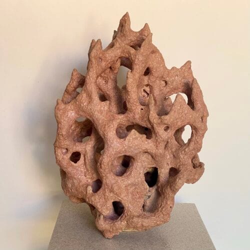 Stoneware sculpture: rose gold lava glaze over reef like form