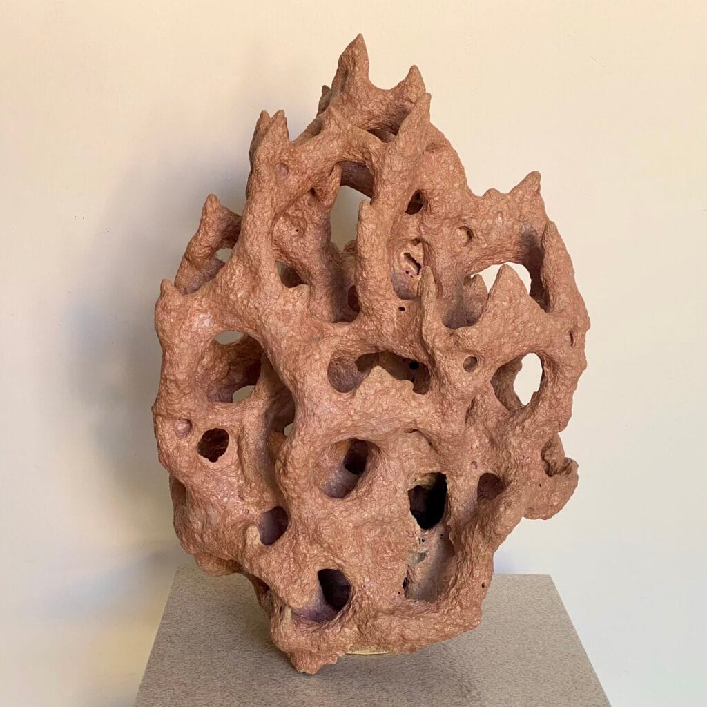Stoneware sculpture: rose gold lava glaze over reef like form