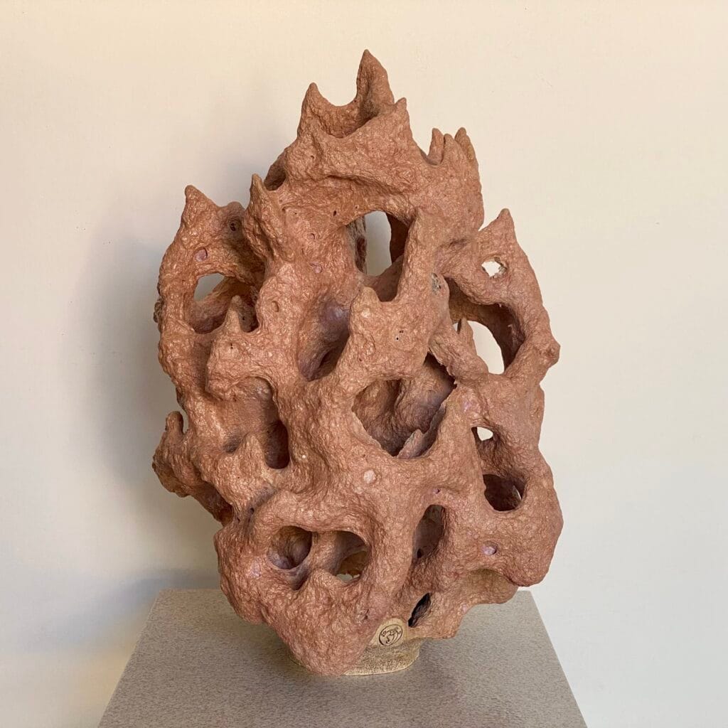 Stoneware sculpture: rose gold lava glaze over reef like form